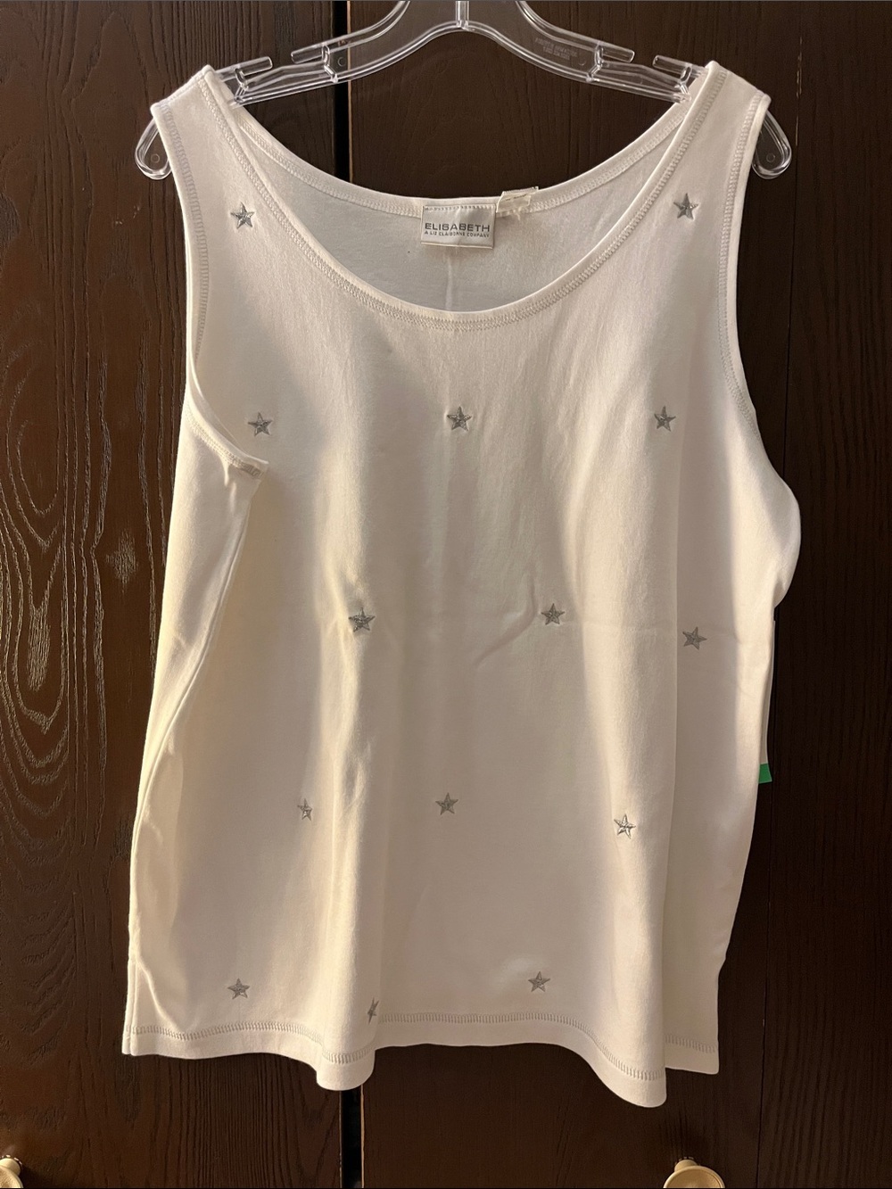 Elizabeth sleeveless white tee with silver stars on the front. Size 1. NWT